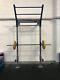 Squat rack, floor and wall mounted with safety bars, for gym