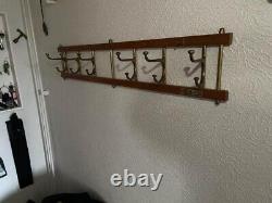 Vintage wall mounted coat hanger rack with hooks, teak wood mid century