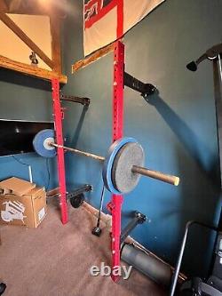 Wall mounted squat rack