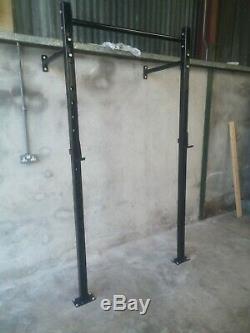 Wall mounted squat rack pull up bar